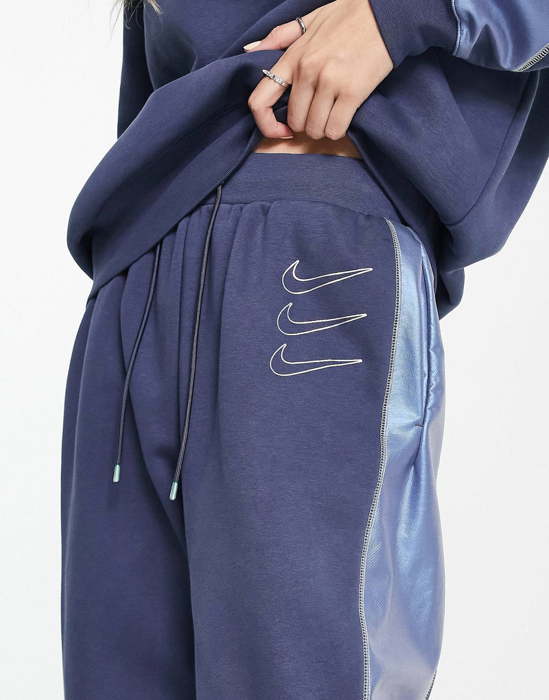 Nike fleece joggers in navy and iridescent