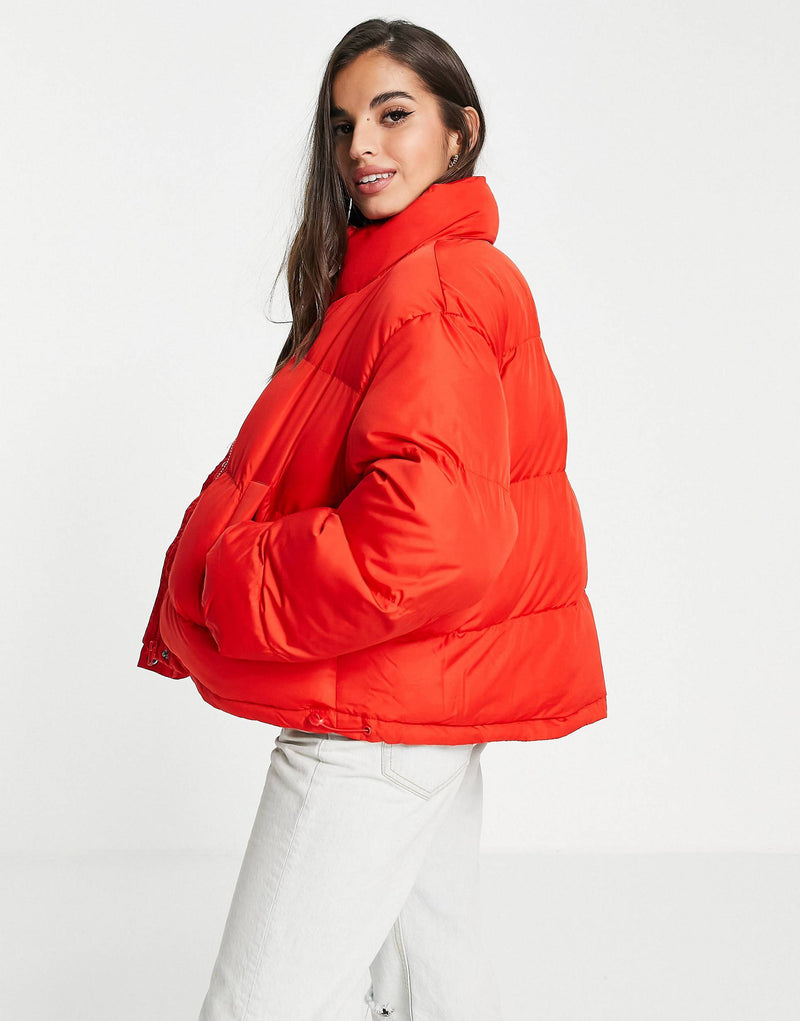 DESIGN oversized recycled puffer jacket in red