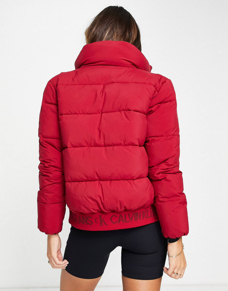 Calvin Klein Jeans logo trim puffer jacket in red