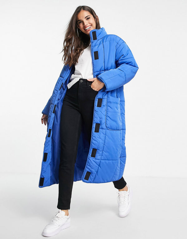 quilted longline puffer coat in cobalt