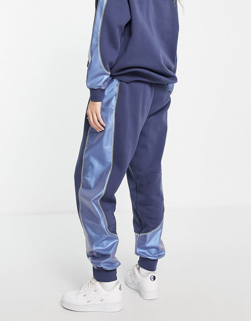 Nike fleece joggers in navy and iridescent